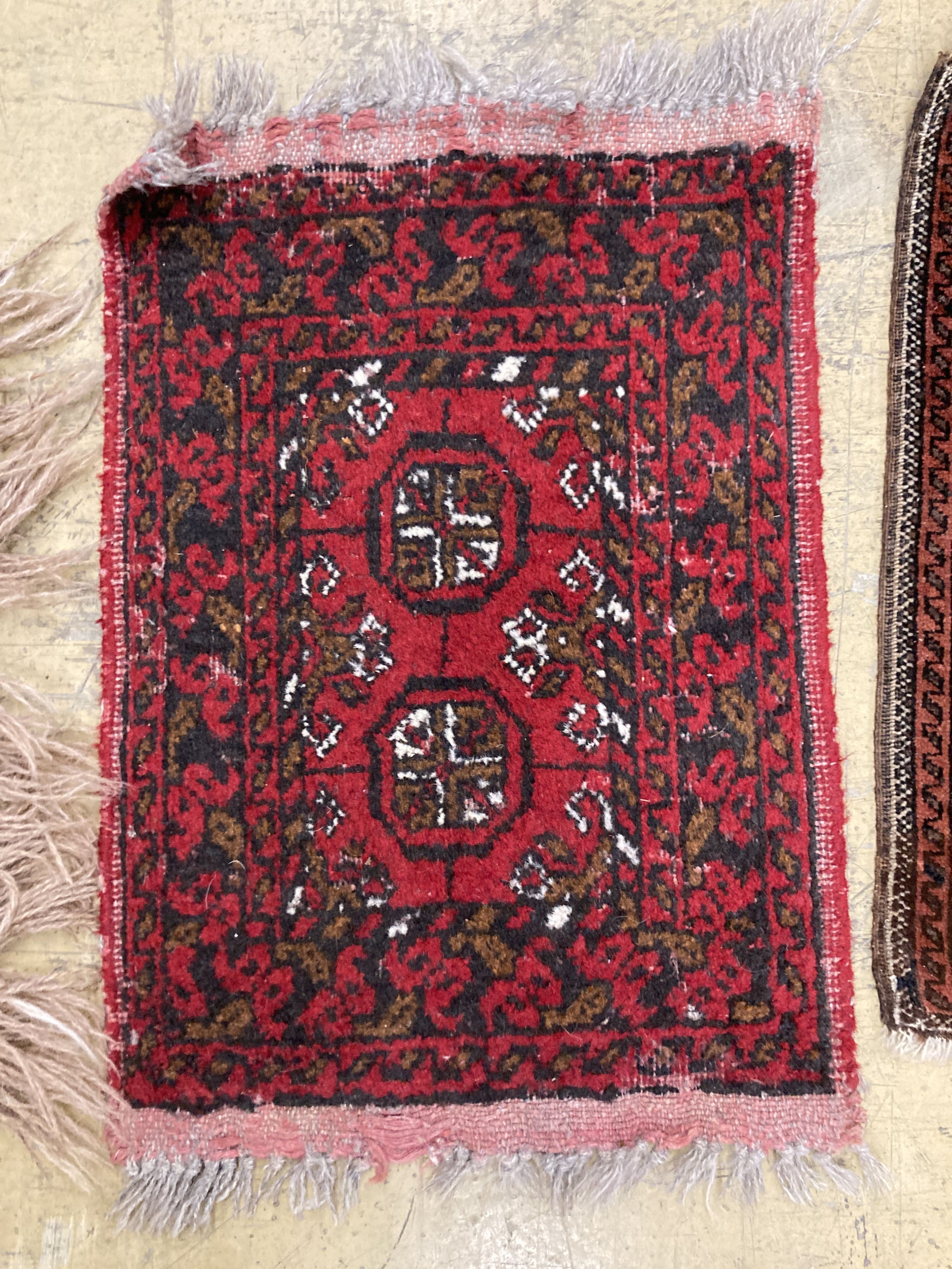 An antique Bokhara rug 170 x 94, Turkoman mat, a Belouch mat and two others.